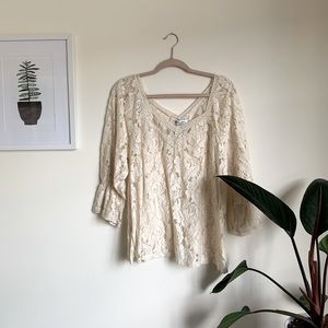 Lacey, cream top. Great condition